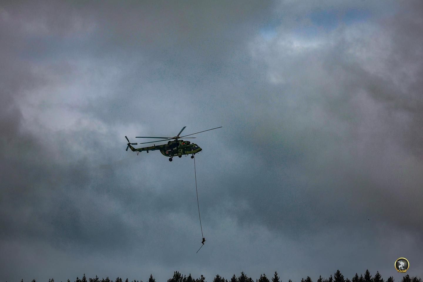 May be an image of skydiving, blimp and helicopter