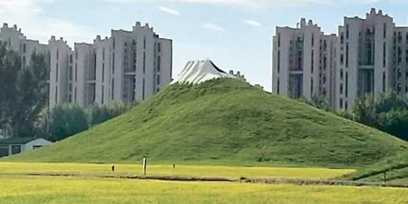 جبل فوجي الصيني.. تل مصبوغ بالأبيض