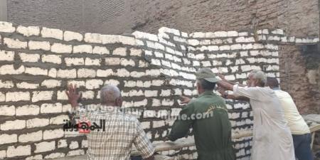إزالة سور مخالف بشارع سنوسرت بمدينة الأقصر 