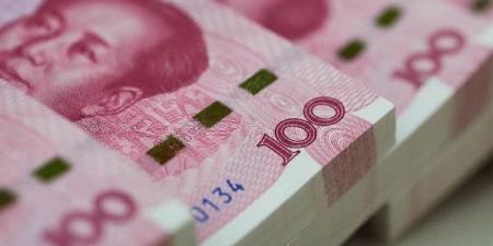اليوان يلامس أعلى مستوى خلال 10 أشهر مقابل الدولار