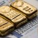 الذهب يهبط بنسبة 2.9% وسط تفاؤل تجاري وارتفاع للدولار