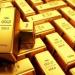 الذهب يواصل التراجع مع قوة الدولار عند تسوية تعاملات الاثنين