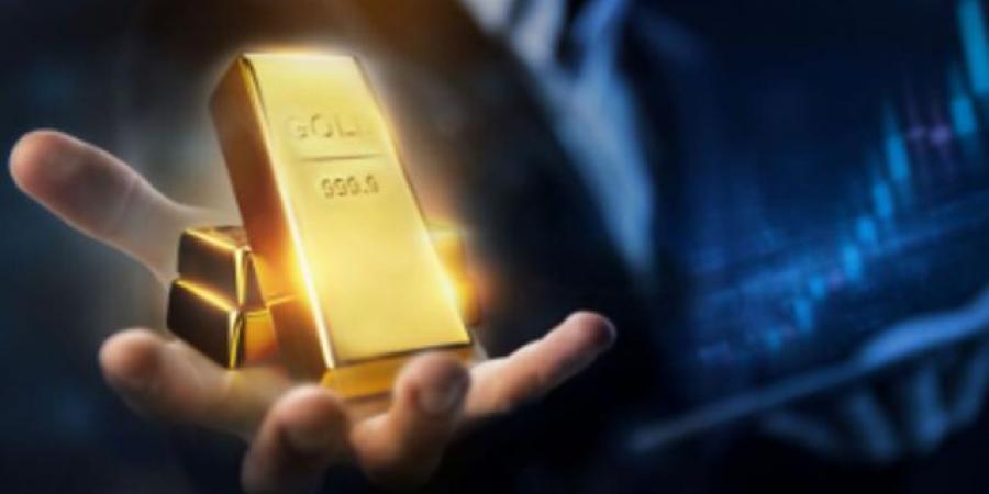 الذهب يتراجع مع صعود الدولار وترقب الأسواق علي خفض الفائدة